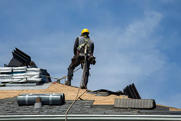 Professional Roof Replacement technician working in Scottsburg, IN
